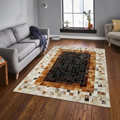 Brown Checkered Patchwork Cowhide Rug with Cream Border